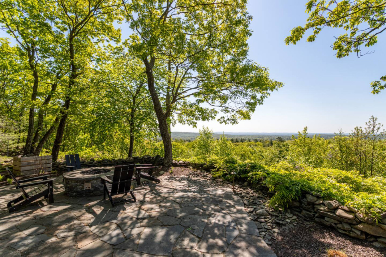 Goat Hill Cottage outdoor seating and fire pit with mountain views