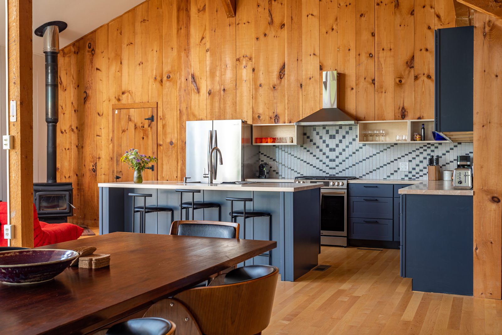 The timber-frame great room of Hilltop Oasis, a Haus-managed home near the Berkshires